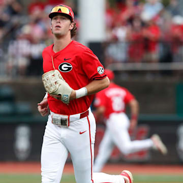 Georgia's Charlie Condon (24) takes the field at the start of a NCAA Athens Regional baseball game against UNCW in Athens, Ga., on Saturday, June 1, 2024