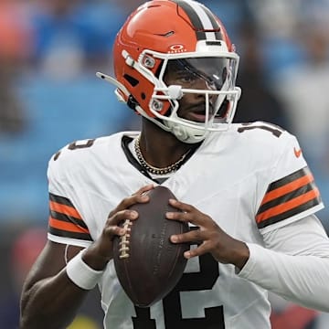 Cleveland Browns quarterback Shedeur Sanders (12)j drops back to pass against the Carolina Panthers during the first quarter at Bank of America Stadium.