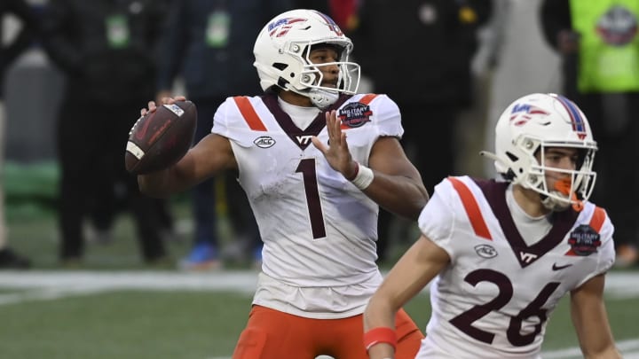 Dec 27, 2023; Annapolis, MD, USA;  Virginia Tech Hokies quarterback Kyron Drones (1) throws to tight end Harrison Saint Germain (87)  for a second quarter touchdown against the Tulane Green Wave at Navy-Marine Corps Memorial Stadium. Mandatory Credit: Tommy Gilligan-USA TODAY Sports