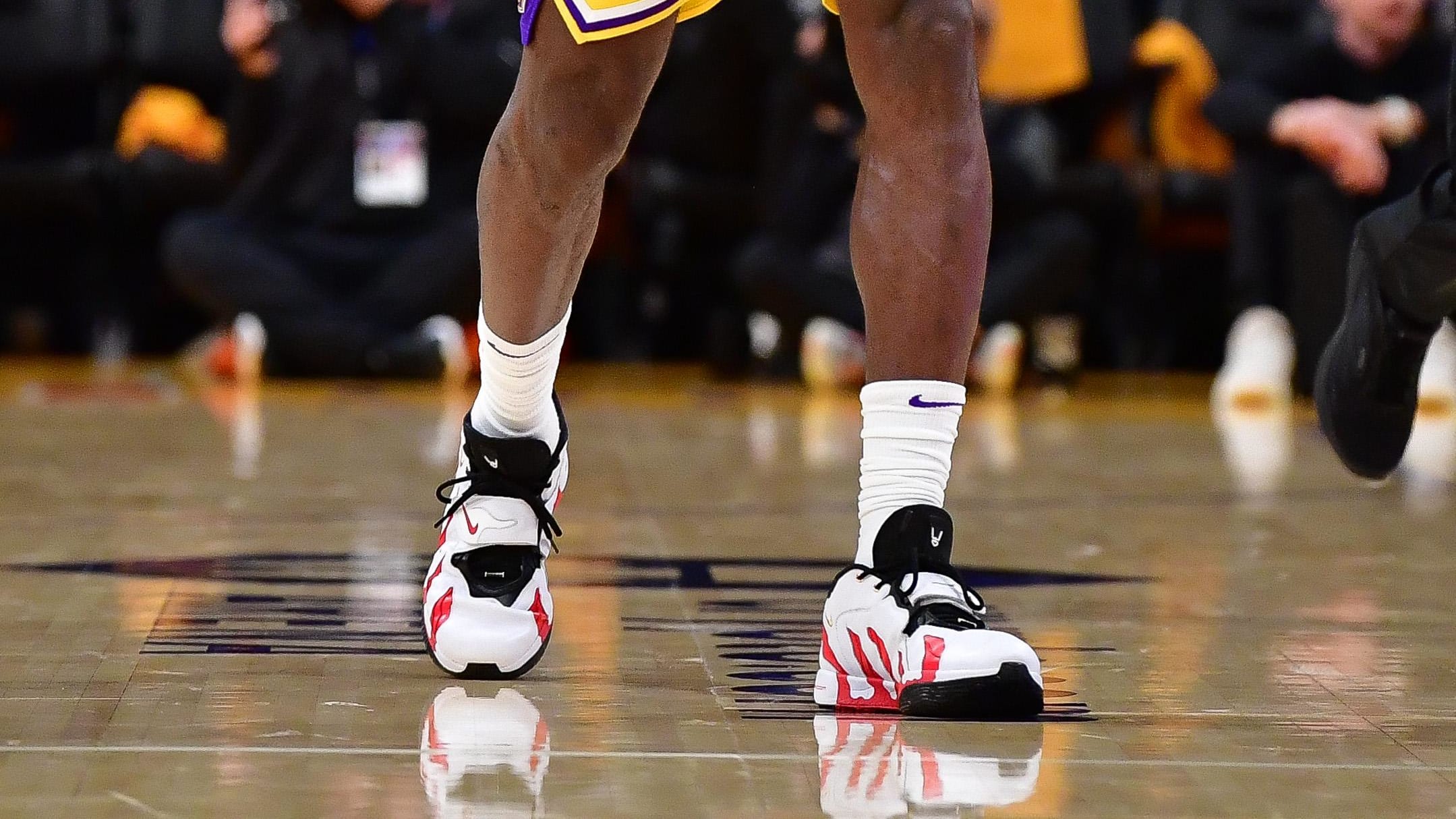  Los Angeles Lakers forward LeBron James' white and red Nike sneakers.