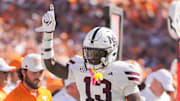 Mississippi State safety Jahron Manning (13) celebrates a missed catch by Tennessee wide receiver Braylon Staley (14)during a college football game between Tennessee and Mississippi State at Davis Wade Stadium in Starkville, Miss.