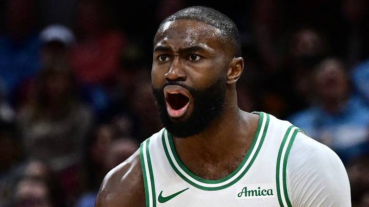 Nov 30, 2025; Cleveland, Ohio, USA; Boston Celtics guard Jaylen Brown (7) reacts after fouling Cleveland Cavaliers guard Donovan Mitchell (45) during the second half at Rocket Arena. Mandatory Credit: David Dermer-Imagn Images