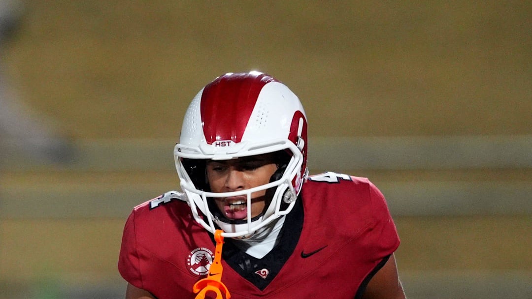 Owasso's Julius Wilson (4) celebrates a touchdown during the Class 6A I high school football championship game between Bixby and Owasso at Chad Richison Stadium in Edmond, Okla., Saturday Dec. 6, 2025.