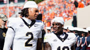 Robby Ashford and Chris Barnes during pregame of Wake Forest at Virginia Tech, Oct. 4, 2025.