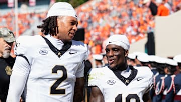 Robby Ashford and Chris Barnes during pregame of Wake Forest at Virginia Tech, Oct. 4, 2025.