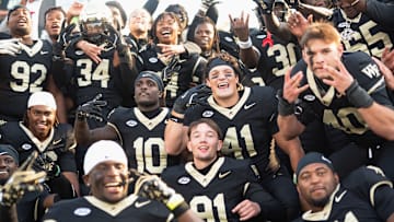 Wake Forest football players celebrate after beating SMU in Week 9. Will the Deacs be celebrating becoming bowl eligible when they take on Virginia in Week 11? 