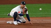 Oct 16, 2025; Seattle, Washington, USA; Seattle Mariners first baseman Josh Naylor (12) makes a force out in the fifth inning against the Toronto Blue Jays during game four of the ALCS round for the 2025 MLB playoffs at T-Mobile Park. Mandatory Credit: Steven Bisig-Imagn Images