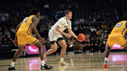 Cooper Schwieger looks to hand off the ball for Wake Forest