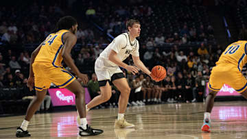 Cooper Schwieger looks to hand off the ball for Wake Forest