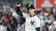 Oct 2, 2025; Bronx, New York, USA; New York Yankees outfielder Cody Bellinger (35) reacts at second base after hitting a double in the fourth inning against the Boston Red Sox during game three of the Wildcard round for the 2025 MLB playoffs at Yankee Stadium. Mandatory Credit: Vincent Carchietta-Imagn Images