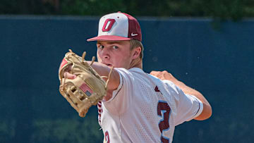 Okemos pitcher Caleb Bonemer (2) pitches in the District Final against Grand Ledge Saturday, June 3, 2023. Bonemer also hit three home runs against the Comets.