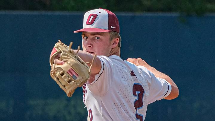 Okemos pitcher Caleb Bonemer (2) pitches in the District Final against Grand Ledge Saturday, June 3, 2023. Bonemer also hit three home runs against the Comets.