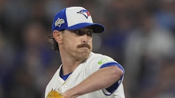 Oct 20, 2025; Toronto, Ontario, CAN; Toronto Blue Jays pitcher Shane Bieber (57) pitches against the Seattle Mariners in the first inning during game seven of the ALCS round for the 2025 MLB playoffs at Rogers Centre. Mandatory Credit: John E. Sokolowski-Imagn Images