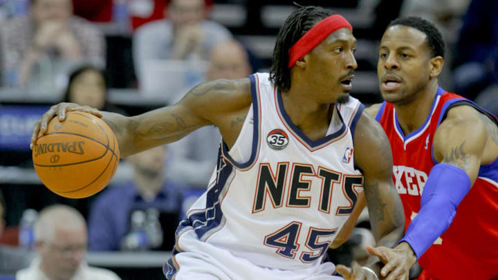 Apr 23, 2012; Newark, NJ, USA; New Jersey Nets small forward Gerald Wallace (45) works the base line against Philadelphia 76ers small forward Andre Iguodala (9) at the Prudential Center. Mandatory Credit: Jim O'Connor-Imagn Images