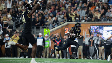Wake Forest running back Demond Claiborne races towards the endzone in the game against North Carolina. 