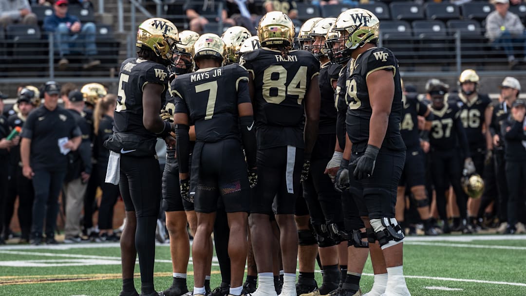 The Wake Forest offense huddles before its drive against the SMU Mustangs on Saturday, Oct. 25, 2025, at Allegacy Federal Credit Union Stadium in Winston-Salem, North Carolina.