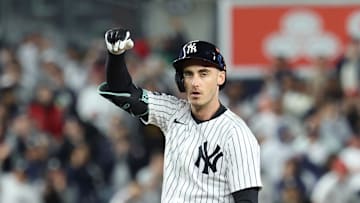 Oct 2, 2025; Bronx, New York, USA; New York Yankees outfielder Cody Bellinger (35) reacts at second base after hitting a double in the fourth inning against the Boston Red Sox during game three of the Wildcard round for the 2025 MLB playoffs at Yankee Stadium. Mandatory Credit: Vincent Carchietta-Imagn Images