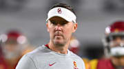 Oct 1, 2022; Los Angeles, California, USA;  USC Trojans head coach Lincoln Riley walks on the field before a game against the Arizona State Sun Devils at United Airlines Field at the Los Angeles Memorial Coliseum. Mandatory Credit: Jayne Kamin-Oncea-Imagn Images