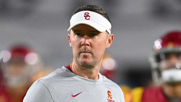 Oct 1, 2022; Los Angeles, California, USA;  USC Trojans head coach Lincoln Riley walks on the field before a game against the Arizona State Sun Devils at United Airlines Field at the Los Angeles Memorial Coliseum. Mandatory Credit: Jayne Kamin-Oncea-Imagn Images