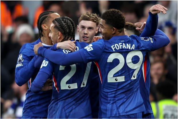 Cole Palmer celebrates his goal for Chelsea against Everton.