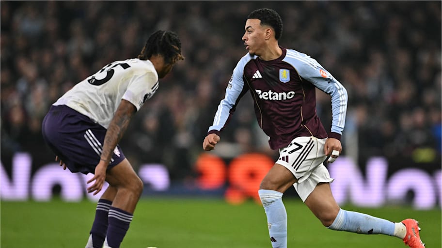 Leny Yoro attempts to defend as Aston Villa’s Morgan Rogers dribbles towards him.