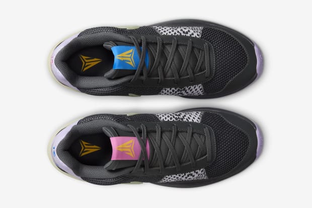 Side view of Ja Morant's black and purple Nike sneakers.