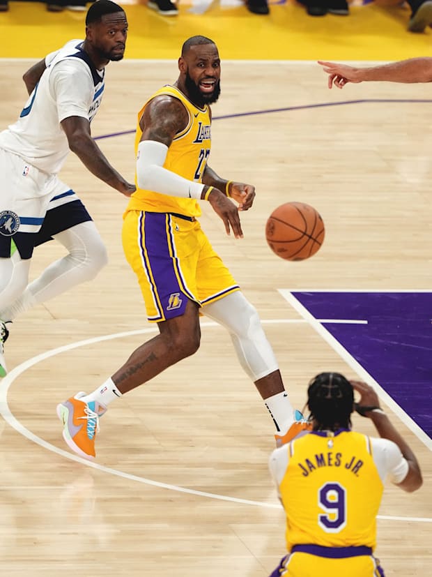 LeBron passes to Bronny during Tuesday’s season opener.