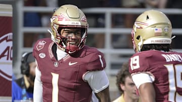 Aug 30, 2025; Tallahassee, Florida, USA; Florida State Seminoles quarterback Tommy Castellanos (1) celebrates with wide receiver Micahi Danzy (19) after a touchdown against the Alabama Crimson Tide during the second half at Doak S. Campbell Stadium. Mandatory Credit: Melina Myers-Imagn Images