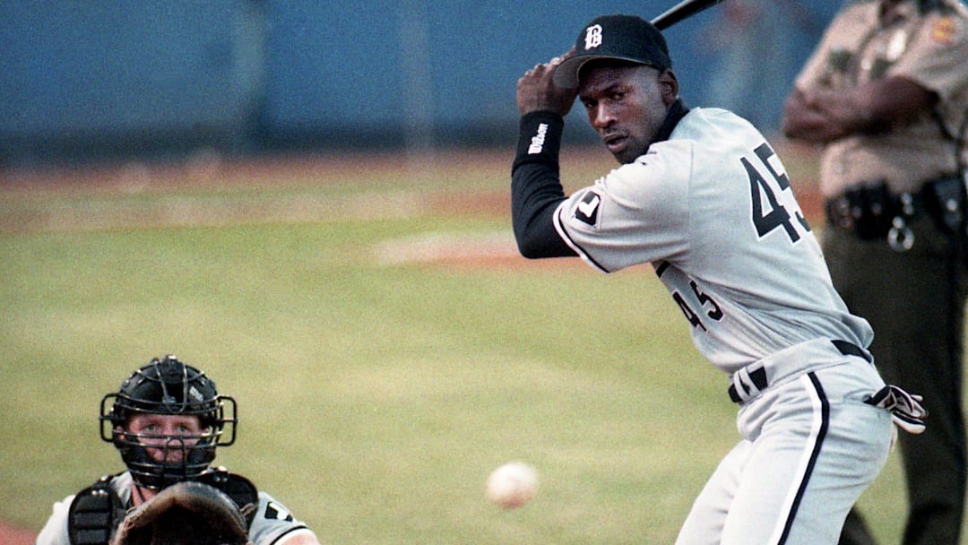 With his starting pitcher warming up, Birmingham Barons right fielder Michael Jordan (45), right, gets a feel for live pitching before their game with Nashville Xpress at Greer Stadium in Nashville on April 23, 1994.