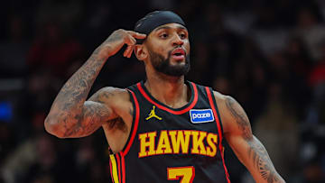 Nov 28, 2025; Atlanta, Georgia, USA; Atlanta Hawks guard Nickeil Alexander-Walker (7) celebrates a three point shot against the Cleveland Cavaliers during the first quarter at State Farm Arena. Mandatory Credit: Jordan Godfree-Imagn Images