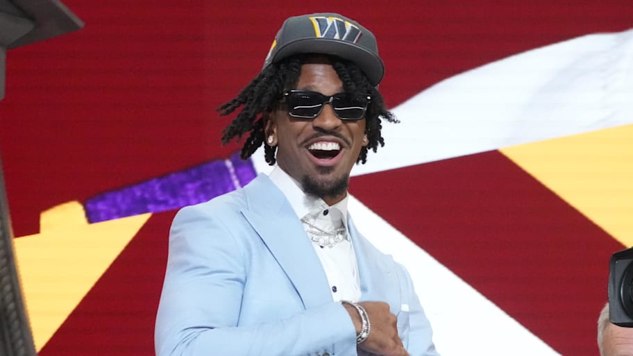 Apr 25, 2024; Detroit, MI, USA; LSU Tigers quarterback Jayden Daniels reacts after being selected by the Washington Commanders as the No. 2 pick in the first round of the 2024 NFL Draft at Campus Martius Park and Hart Plaza. Mandatory Credit: Kirby Lee-Imagn Images | Kirby Lee-Imagn Images