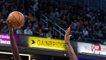 Feb 2, 2024; Indianapolis, Indiana, USA; Indiana Pacers forward Pascal Siakam (43) shoots the ball while Sacramento Kings forward Harrison Barnes (40) defends in the first half at Gainbridge Fieldhouse. Mandatory Credit: Trevor Ruszkowski-USA TODAY Sports