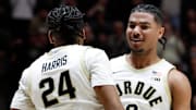 Purdue Boilermakers guard Gicarri Harris (24) celebrates with guard C.J. Cox (0) 