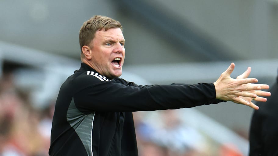 Eddie Howe waving his arms around.