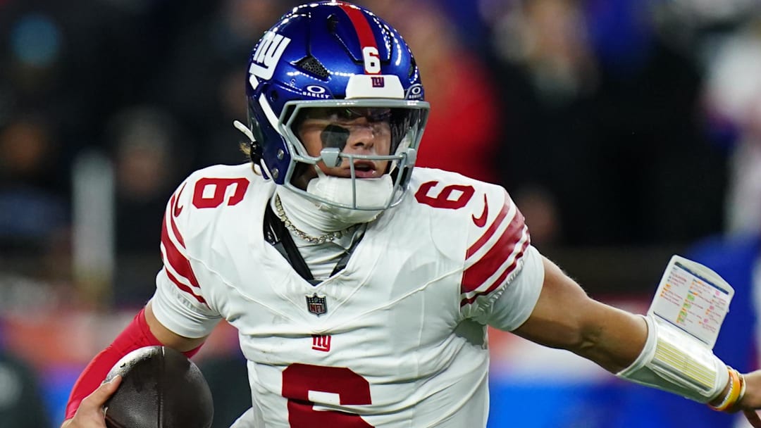 Dec 1, 2025; Foxborough, Massachusetts, USA; New York Giants quarterback Jaxson Dart (6) runs with the ball during the second quarter against the New England Patriots at Gillette Stadium.  