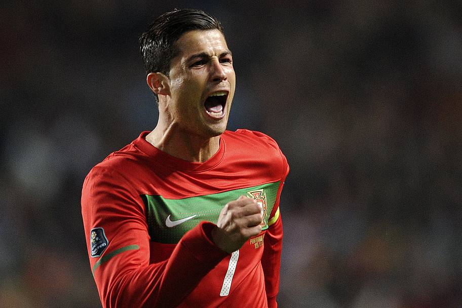 Portugal's forward Cristiano Ronaldo celebrates after scoring a goal against Bosnia Hergovina.