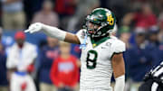 Jan 1, 2022; New Orleans, LA, USA; Baylor Bears safety Jalen Pitre (8) gestures after a play against the Mississippi Rebels in the second quarter of the 2022 Sugar Bowl at the Caesars Superdome. Mandatory Credit: Chuck Cook-Imagn Images