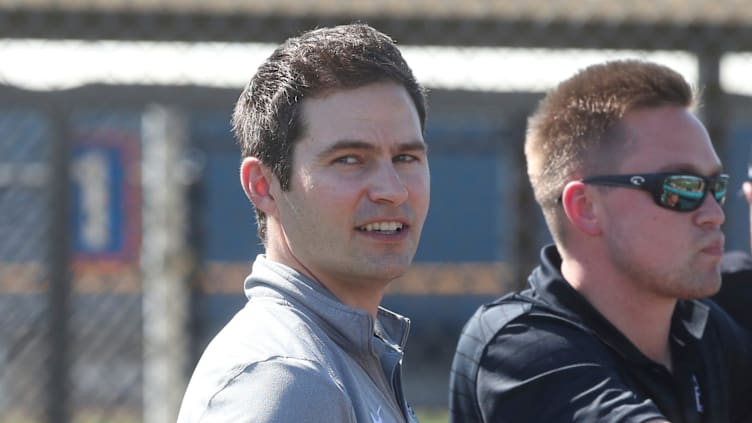 Tigers president of baseball operations Scott Harris watches batting practice during spring training