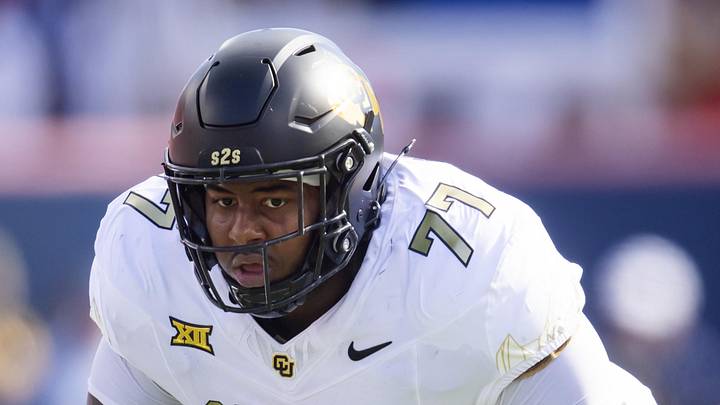 Oct 19, 2024; Tucson, Arizona, USA; Colorado Buffalos offensive tackle Jordan Seaton (77) against the Arizona Wildcats at Arizona Stadium. Mandatory Credit: Mark J. Rebilas-Imagn Images