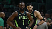 Feb 28, 2025; Boston, Massachusetts, USA; Boston Celtics guard Jaylen Brown (7) and forward Jayson Tatum (0) stand on the court during a timeout during the second half of their loss to the Cleveland Cavaliers at TD Garden. Mandatory Credit: Winslow Townson-Imagn Images