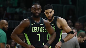 Feb 28, 2025; Boston, Massachusetts, USA; Boston Celtics guard Jaylen Brown (7) and forward Jayson Tatum (0) stand on the court during a timeout during the second half of their loss to the Cleveland Cavaliers at TD Garden. Mandatory Credit: Winslow Townson-Imagn Images