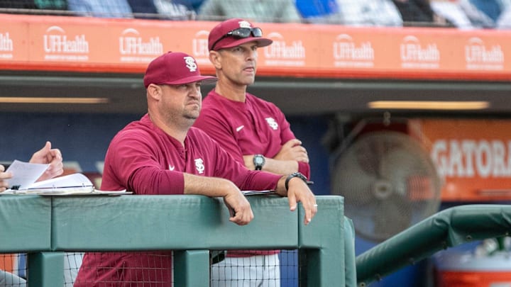 Florida State's head coach Link Jarrett watches from the dugout in the game against Florida, Tuesday, April 11, 2023, at Condron Family Baseball Park in Gainesville, Florida. The Gators beat the Seminoles 5-3. [Cyndi Chambers/ Gainesville Sun] 2023Gator Baseball April 11 2023 Condron Family Ballpark Season OpenerSyndication Gator Sports