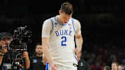 Apr 5, 2025; San Antonio, TX, USA;  Duke Blue Devils forward Cooper Flagg (2) reacts after losing to the Houston Cougars in the semifinals of the men's Final Four of the 2025 NCAA Tournament at the Alamodome. Mandatory Credit: Robert Deutsch-Imagn Images