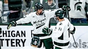 Michigan State's Charlie Stramel, left, celebrates his goal with Owen West during the second period against New Hampshire on Thursday, Oct. 9, 2025, at Munn Ice Arena in East Lansing.