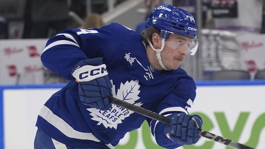 Jan 27, 2026; Toronto, Ontario, CAN; Toronto Maple Leafs forward Bobby McMann (74) shoots the puck during warm up before a game against the Buffalo Sabres at Scotiabank Arena. Mandatory Credit: John E. Sokolowski-Imagn Images