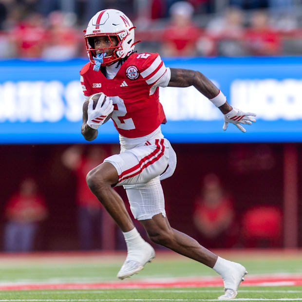 Nebraska punt returner Jacory Barney Jr. returns a punt 19 yards against Akron.