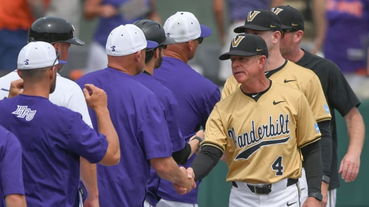 Jun 1, 2024; Clemson, South Carolina, USA; Vanderbilt Commodores head coach Tim Corbin shakes hands with High Point head coach Joey Hammond after the NCAA baseball Clemson Regional at Doug Kingsmore Stadium.  Mandatory Credit: Ken Ruinard-USA TODAY Sports