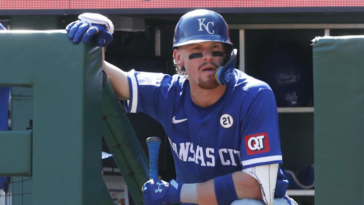 Sep 15, 2024; Pittsburgh, Pennsylvania, USA;  Kansas City Royals shortstop Bobby Witt Jr. (7) waits for his turn to bat on the dugout steps against the Pittsburgh Pirates during the fourth inning at PNC Park. Mandatory Credit: Charles LeClaire-Imagn Images