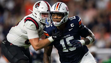 Auburn Tigers defensive end Keldric Faulk (15) blitzes as Auburn Tigers take on Ball State Cardinals at Jordan-Hare Stadium in Auburn, Ala. on Saturday, Sept. 6, 2025. Auburn Tigers defeated Ball State Cardinals 42-3.