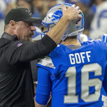 Detroit Lions head coach Dan Campbell with quarterback Jared Goff (16) during the second quarter against Commanders